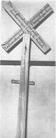 SA0721a - Photo showing Shaker cross posted outside buildings at the height of a religious revival in 1843. Identified on the back.